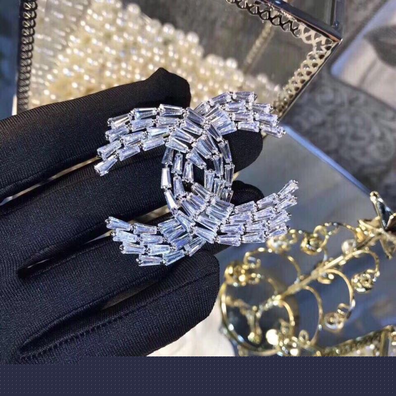 Ch*el brooches